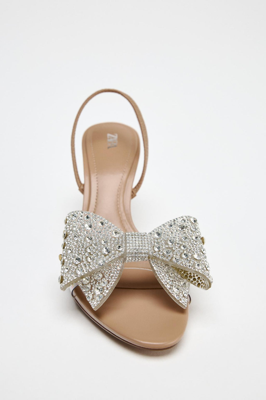 IMPORTED HEELS WITH SHINNY BOW