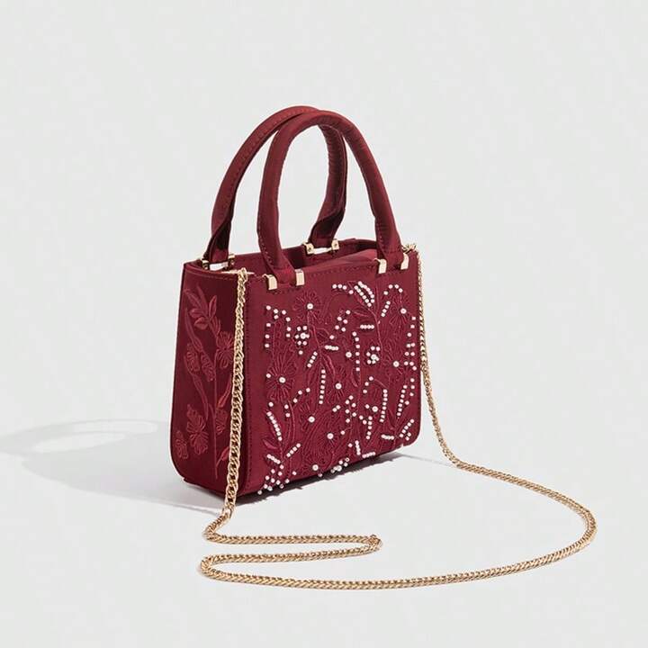 SATIN-EFFECT PEARL HANDBAG