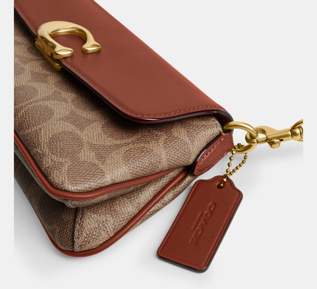 Jet Shoulder Bag In Signature Canvas