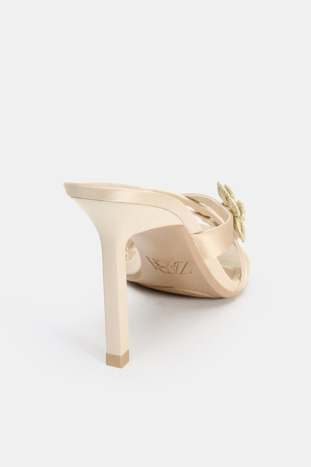 HEELED SANDALS WITH SHINY FLOWERS