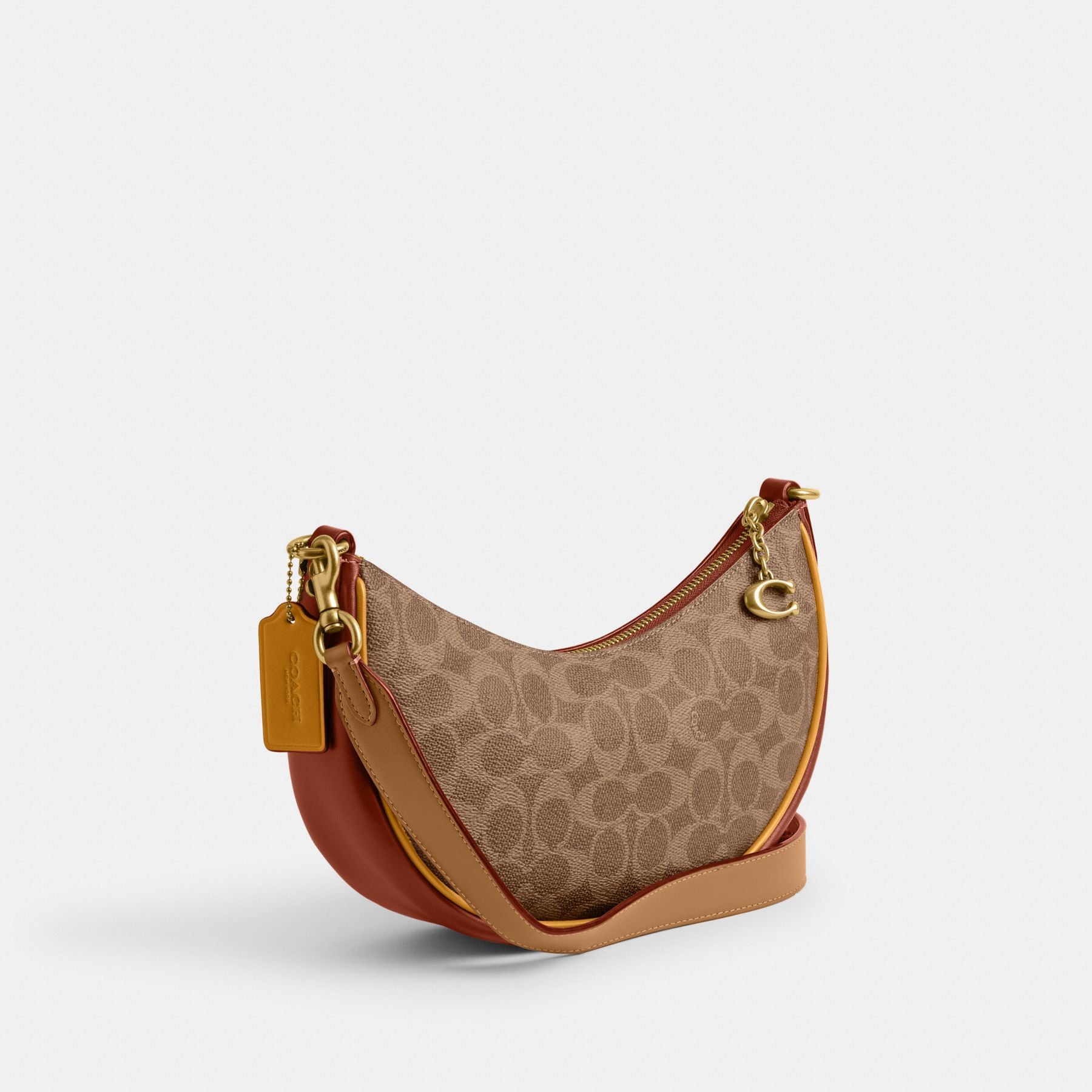 MIRA SHOULDER BAG IN SIGNATURE CANVAS