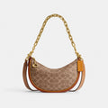 MIRA SHOULDER BAG IN SIGNATURE CANVAS