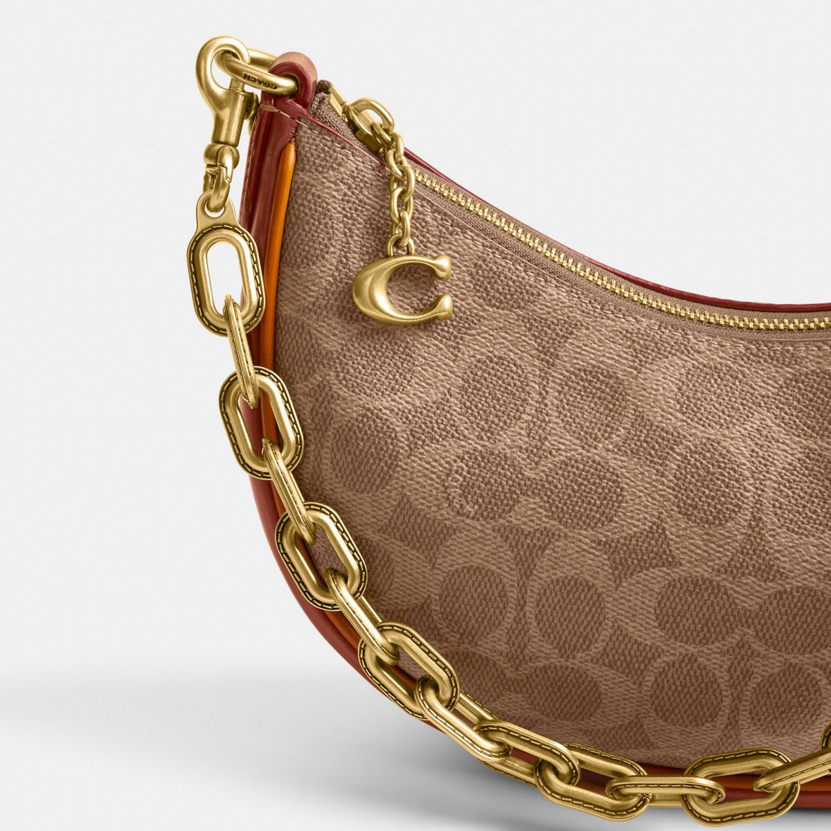 MIRA SHOULDER BAG IN SIGNATURE CANVAS