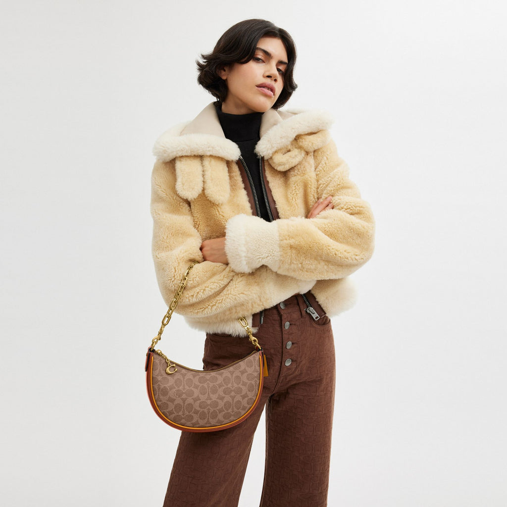 MIRA SHOULDER BAG IN SIGNATURE CANVAS