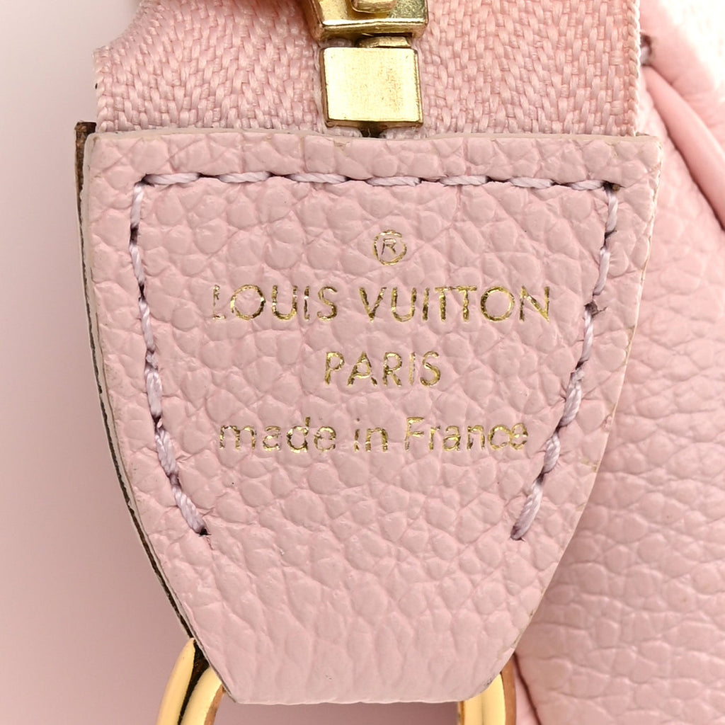 LOUIS VUITTON Empreinte Monogram Giant Mini Pochette Accessories pink