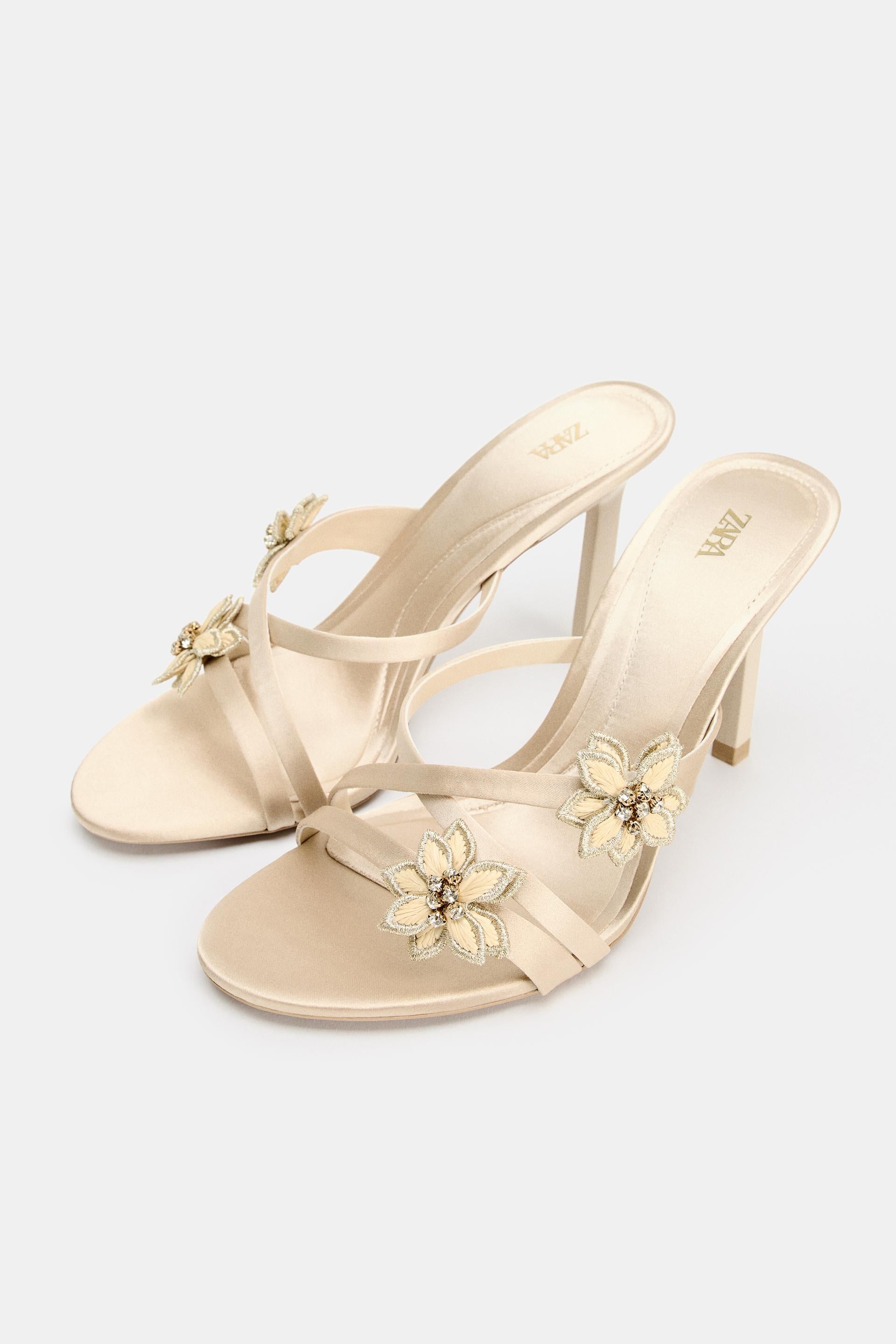 HEELED SANDALS WITH SHINY FLOWERS