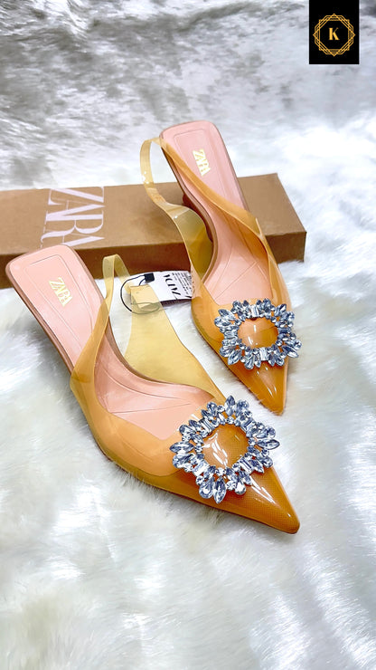 Imported pointed buckle heels