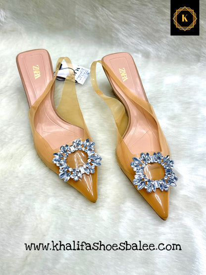 Imported pointed buckle heels