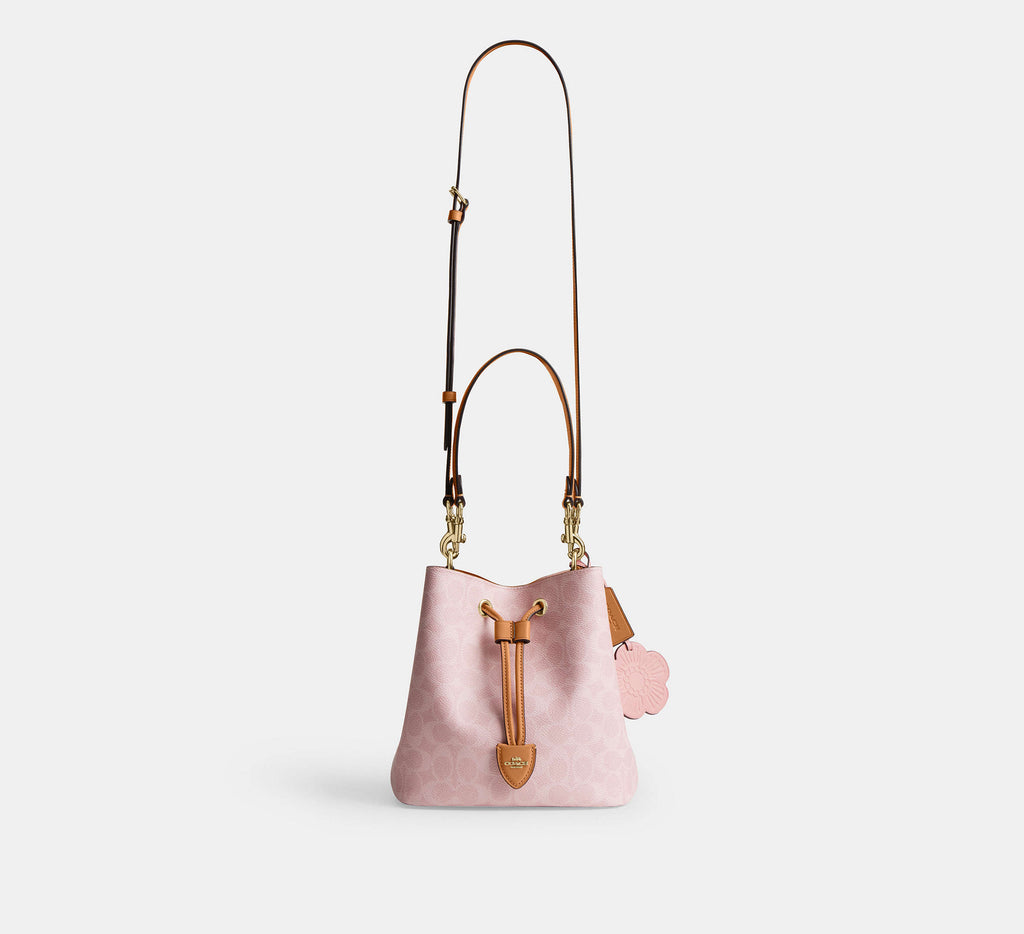 Rowan Bucket Bag In Signature Canvas With Charms