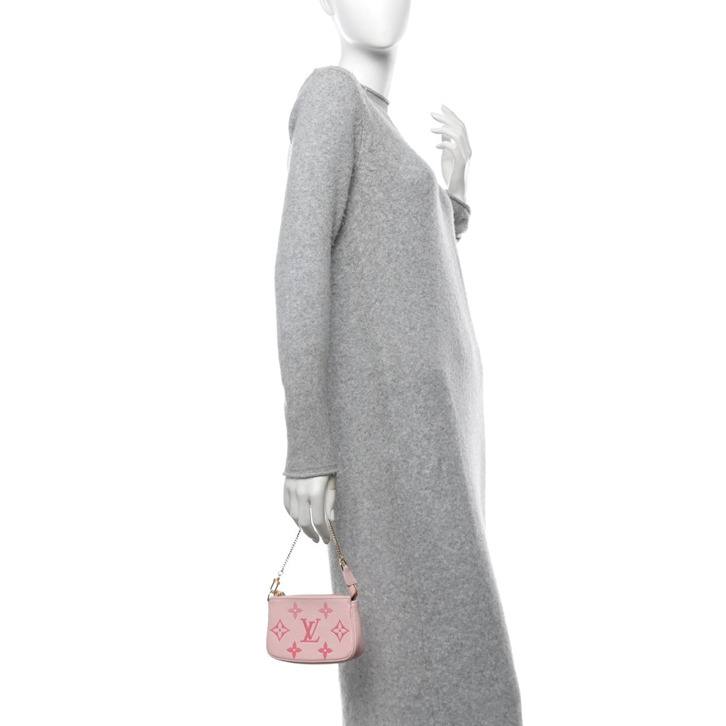 LOUIS VUITTON Empreinte Monogram Giant Mini Pochette Accessories pink