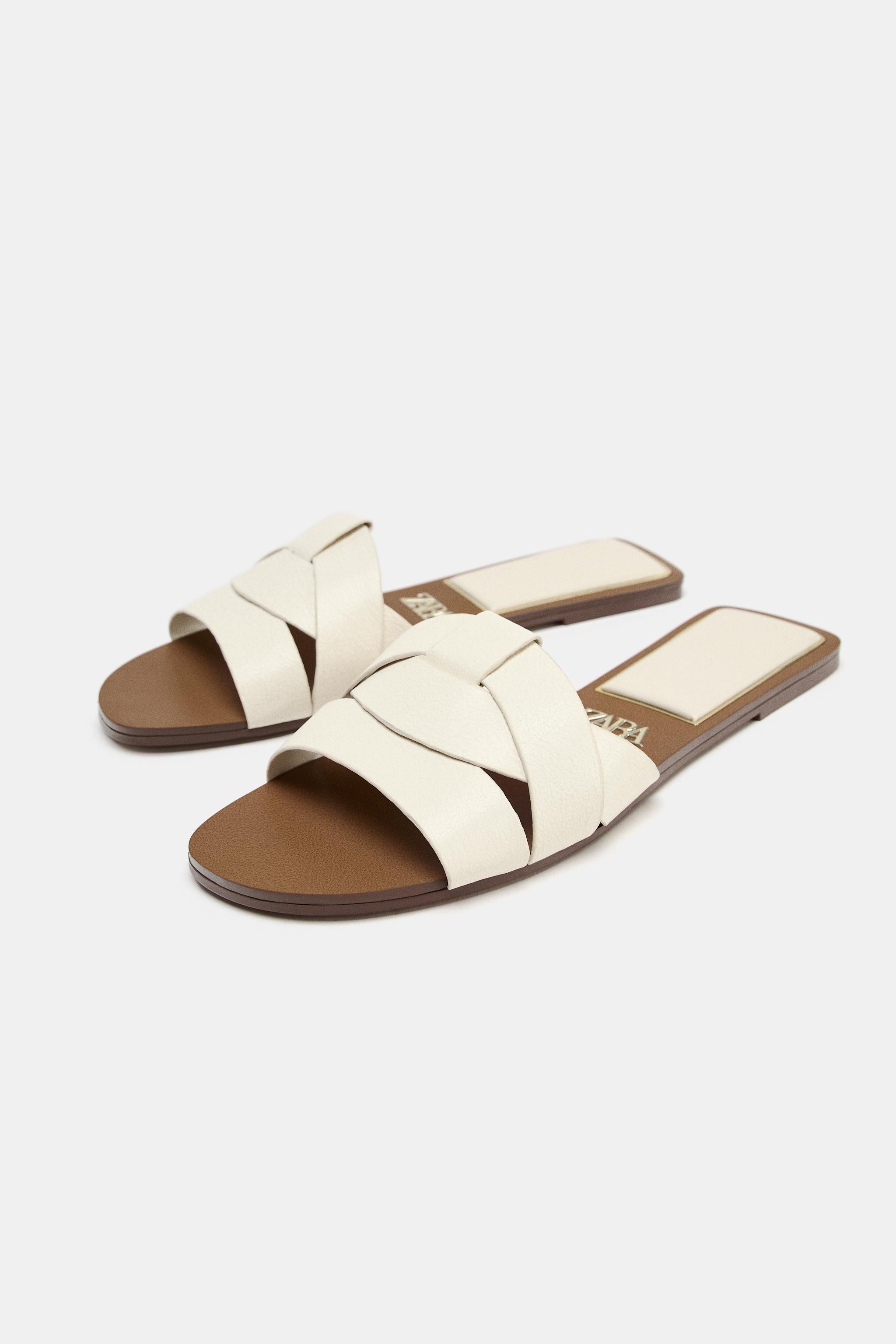 FLAT CROSSED LEATHER SANDALS