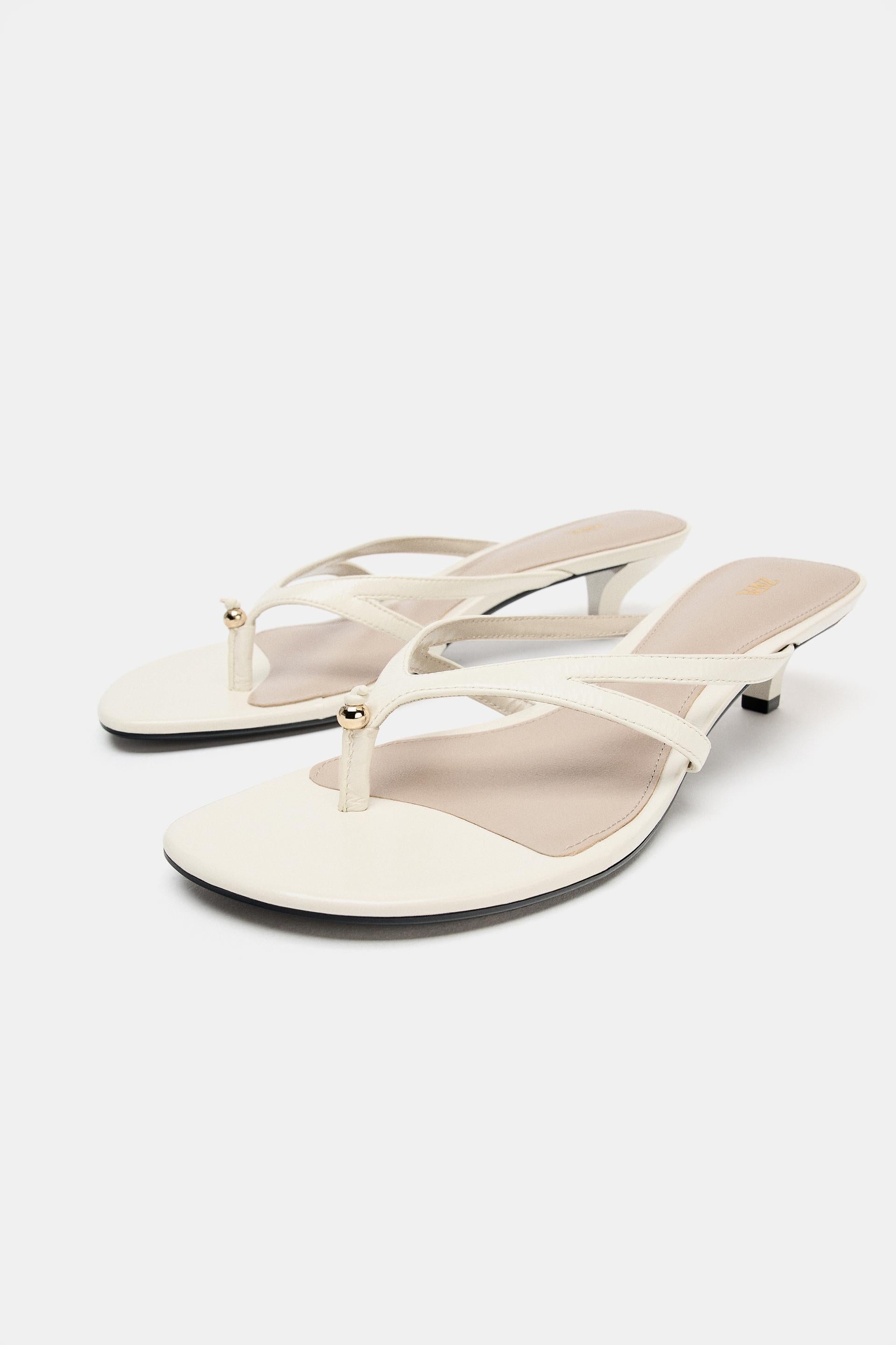 LEATHER SANDALS WITH METAL DETAIL