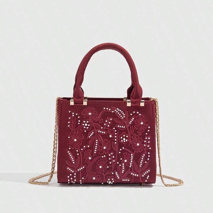 SATIN-EFFECT PEARL HANDBAG