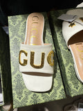 Gucci cara slides white