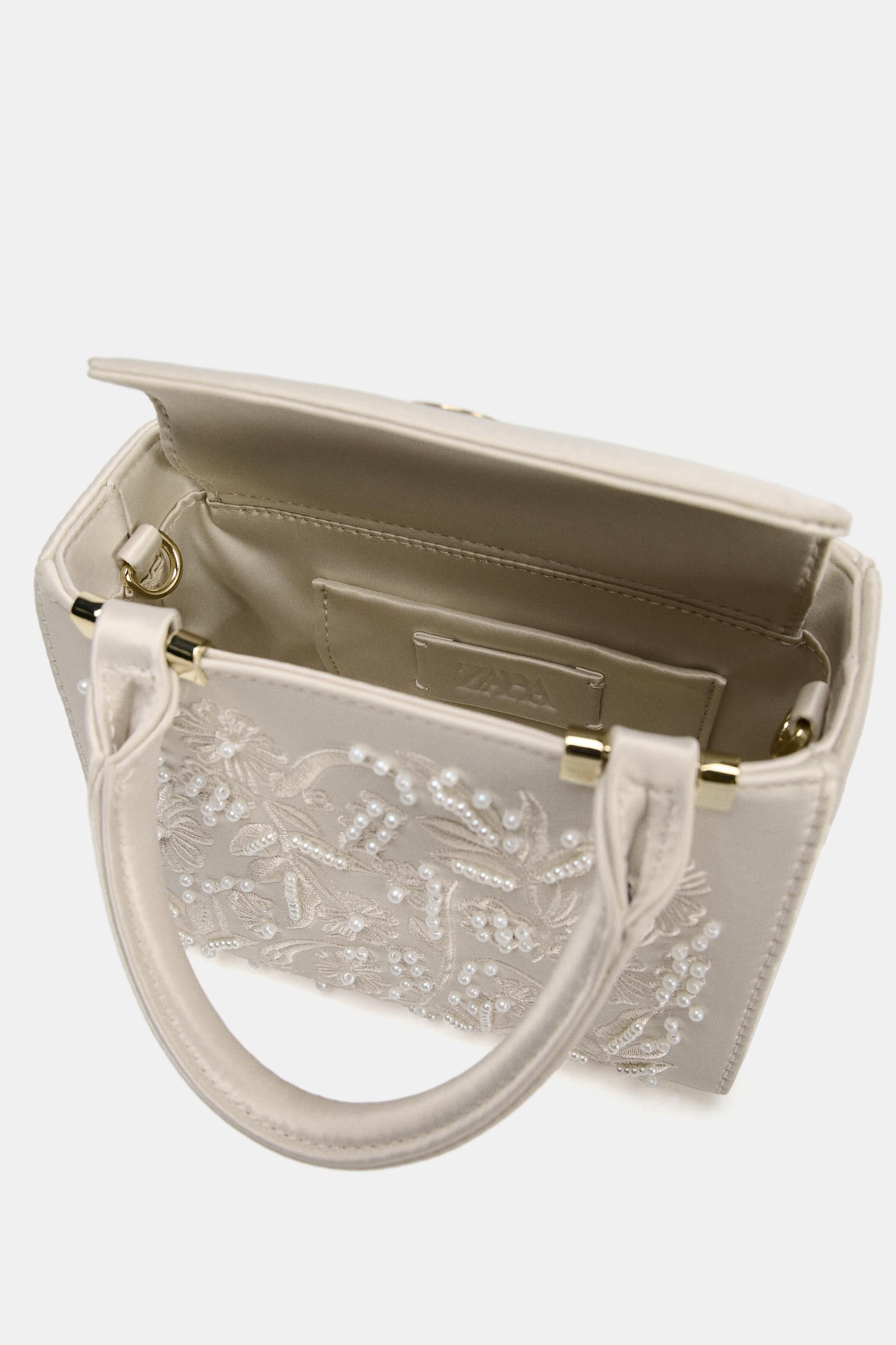 SATIN-EFFECT PEARL HANDBAG