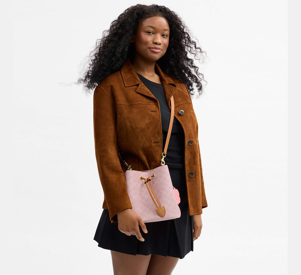 Rowan Bucket Bag In Signature Canvas With Charms