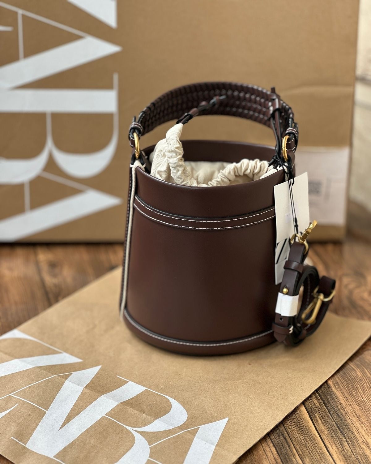 IMPORTED HANDLE BUCKET BAG