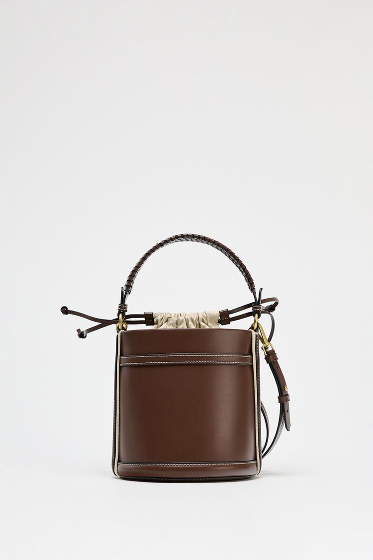 IMPORTED HANDLE BUCKET BAG