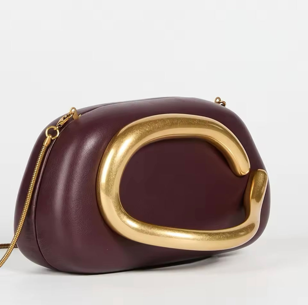 Imported-burgundy clutch