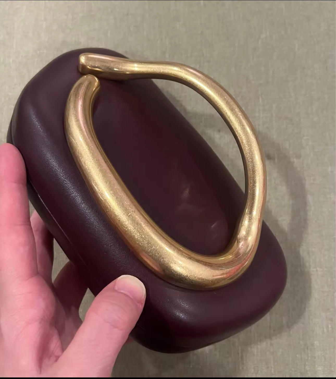 Imported-burgundy clutch