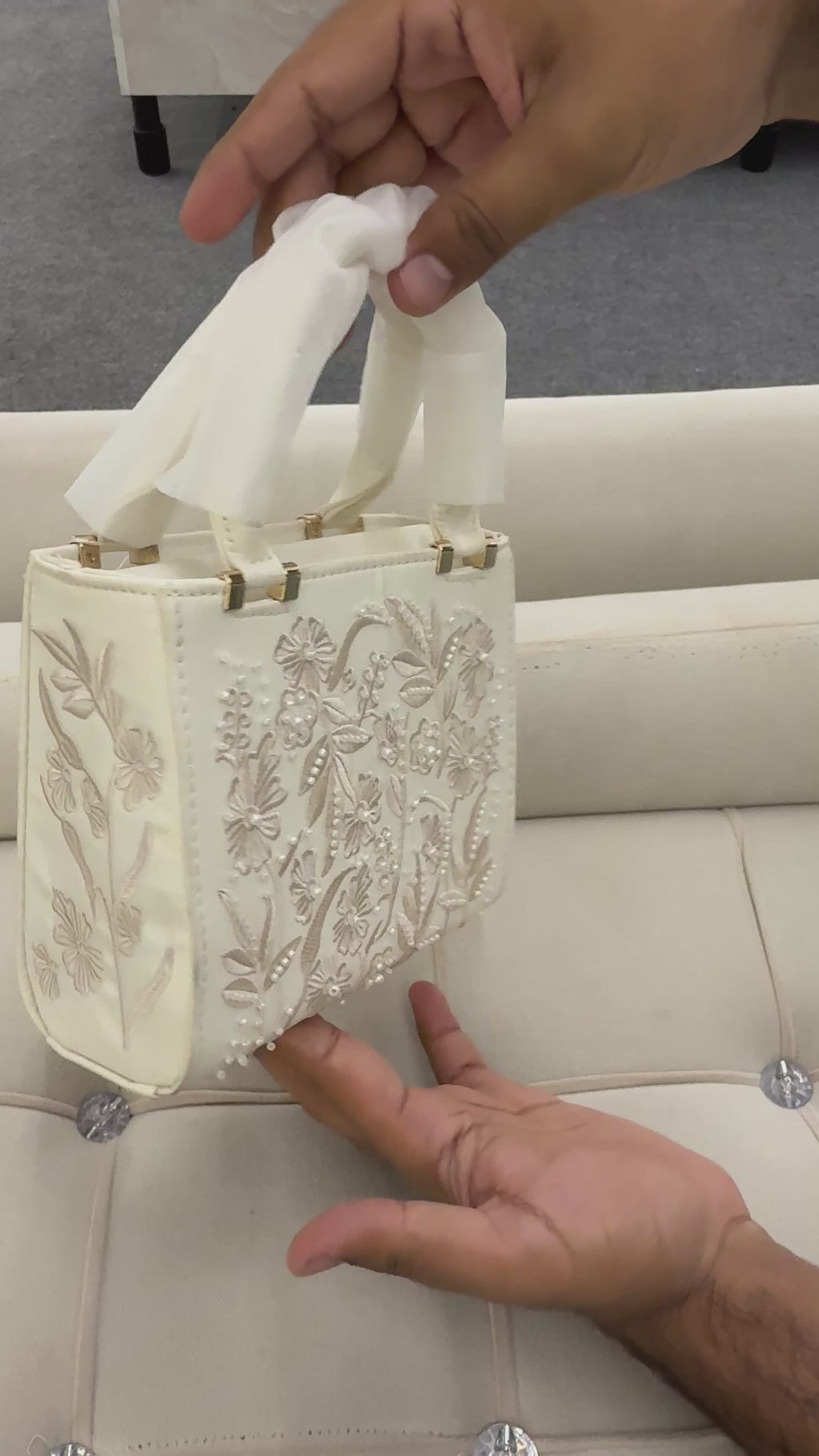 SATIN-EFFECT PEARL HANDBAG